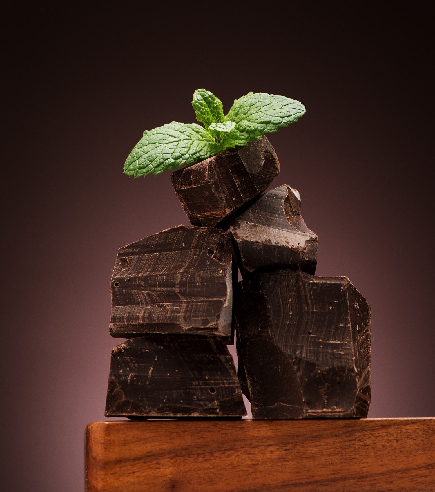 dark chocolate with mint on a dark background